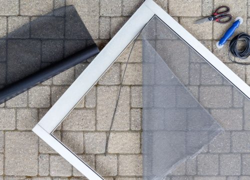 Repairing screen storm porch door with new material